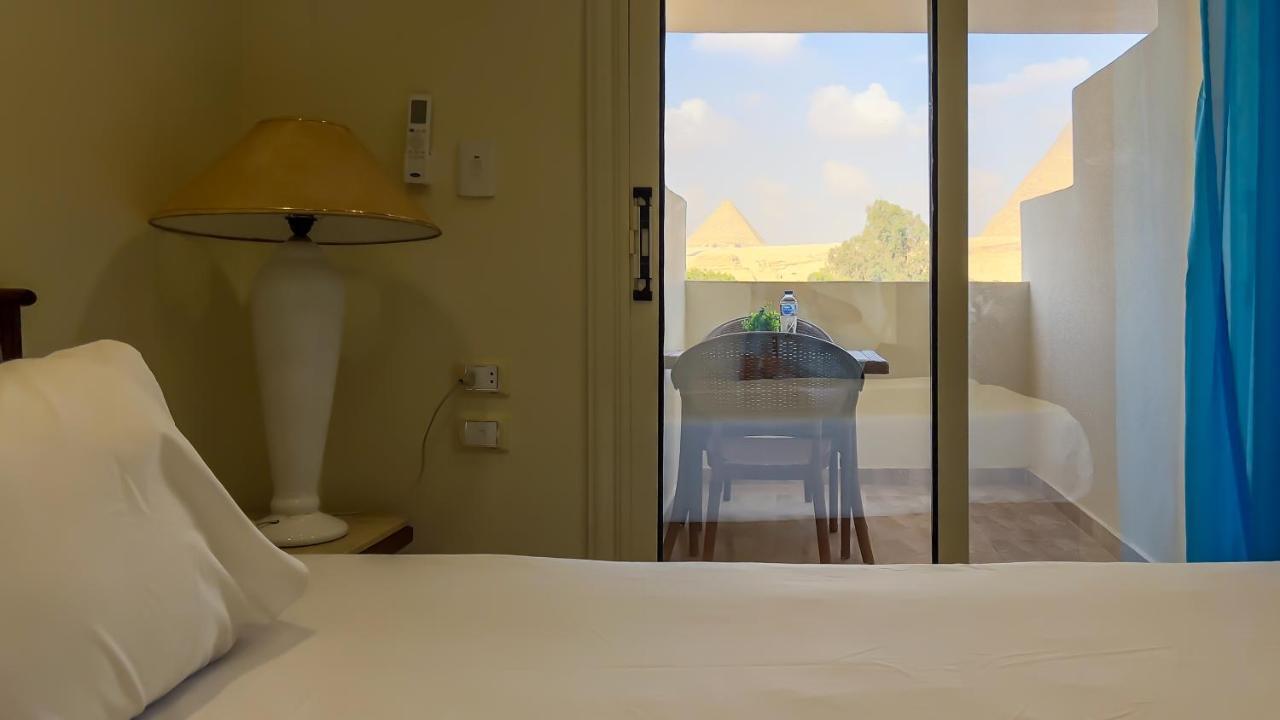 Pyramids Glory Inn Kafret el-Gabal Екстериор снимка